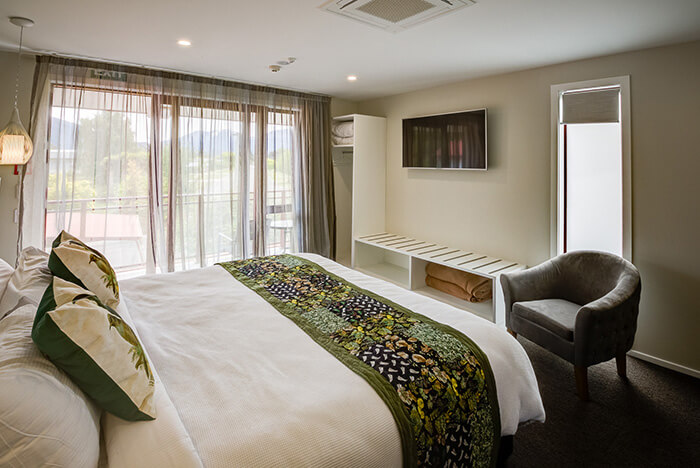 Inside Red Tussock premium studio room with super king bed 